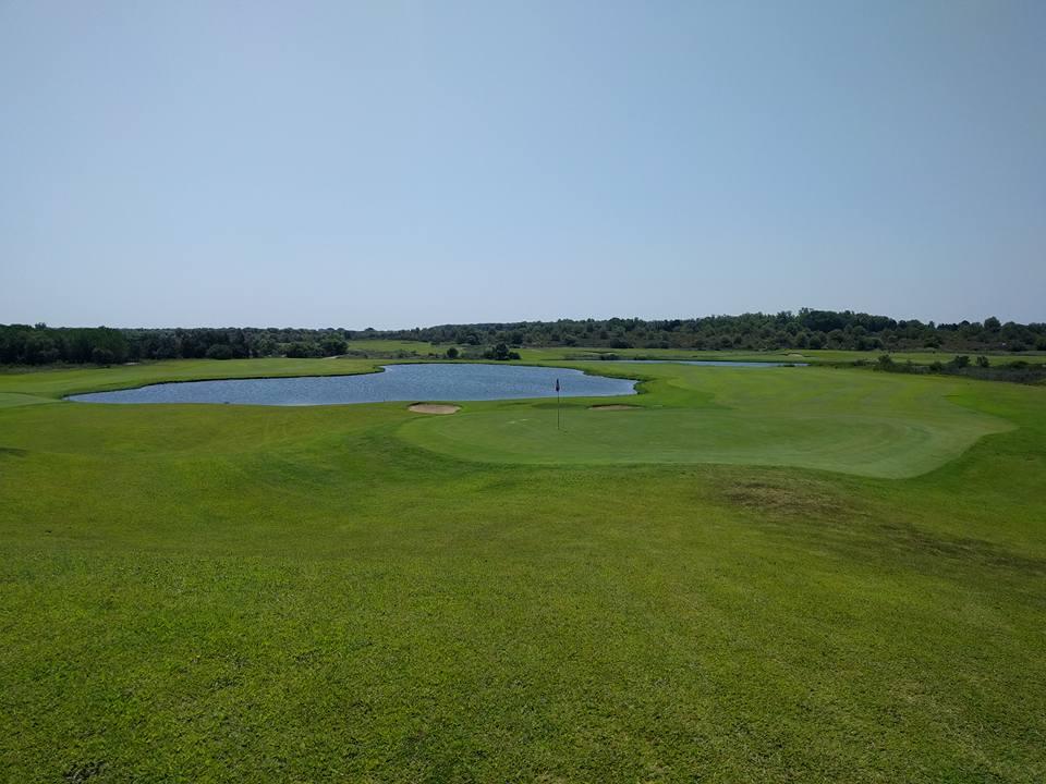 Buca 18 vista dal green